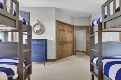 This is a beautifully maintained four-bedroom, five-bathroom