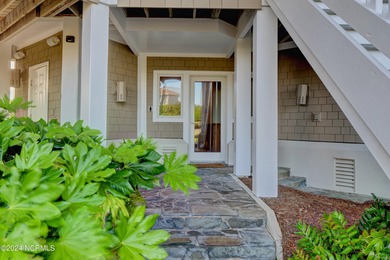 This is a beautifully maintained four-bedroom, five-bathroom