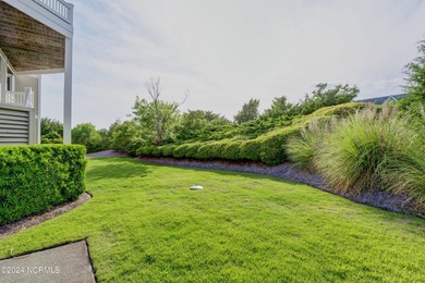 This is a beautifully maintained four-bedroom, five-bathroom