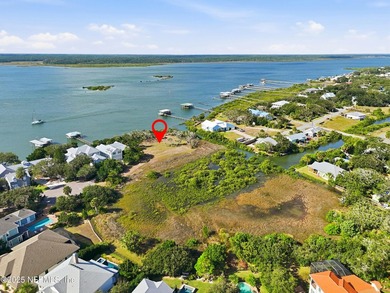 This peninsula property is just under an acre and sits at the - photo 3