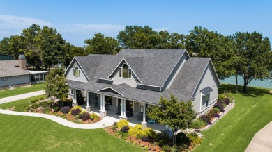 Stunning 4/2.5/2 with Boathouse on Richland Chambers Lake! - Lake Home For Sale in Corsicana, Texas