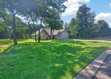 Located on three premium wooded lots in the gated community of - photo 2
