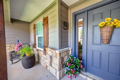 Located on three premium wooded lots in the gated community of - photo 5