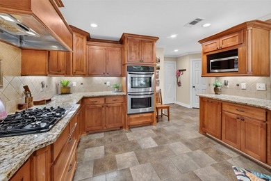 Located on three premium wooded lots in the gated community of - photo 9