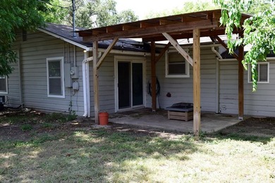 Welcome home to this delightful 3-bedroom, 2-bath cottage-style - photo 8