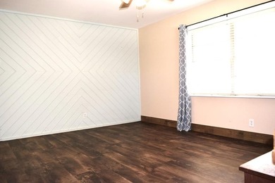 Welcome home to this delightful 3-bedroom, 2-bath cottage-style - photo 10