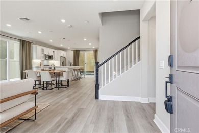 The open-concept floor plan showcases impressive 10-foot - photo 7