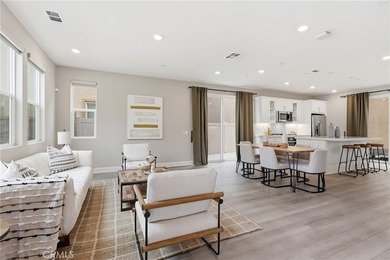 The open-concept floor plan showcases impressive 10-foot - photo 8