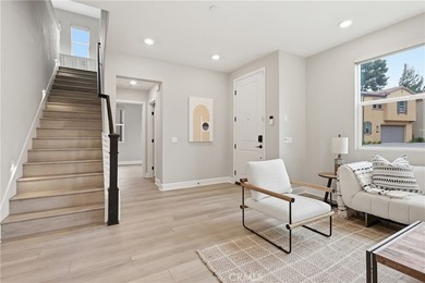 The open-concept floor plan showcases impressive 10-foot - photo 9