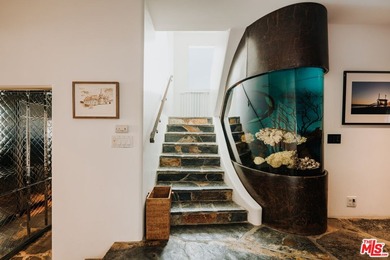 Bold design and modern features coalesce in this newly remodeled - photo 11