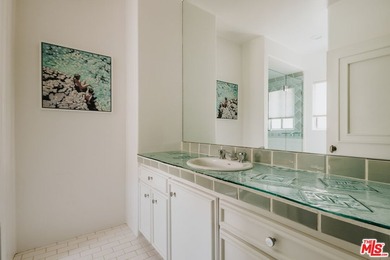 Bold design and modern features coalesce in this newly remodeled - photo 21