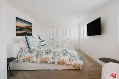 Bold design and modern features coalesce in this newly remodeled - photo 24