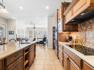 This sprawling one-story custom stone home sits on 4.33 acres of