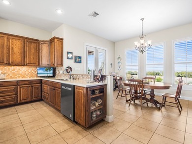 This sprawling one-story custom stone home sits on 4.33 acres of