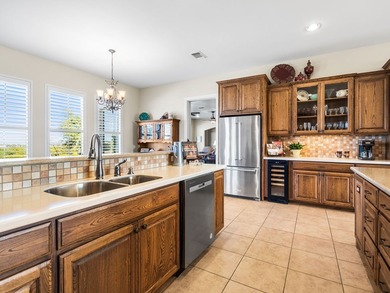 This sprawling one-story custom stone home sits on 4.33 acres of