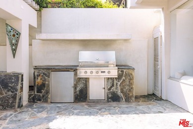 Bold design and modern features coalesce in this newly remodeled - photo 34