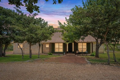 This beautifully updated 4-bedroom, 3-bath custom limestone home - photo 2