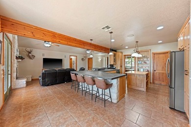 This beautifully updated 4-bedroom, 3-bath custom limestone home - photo 6