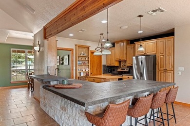 This beautifully updated 4-bedroom, 3-bath custom limestone home - photo 8