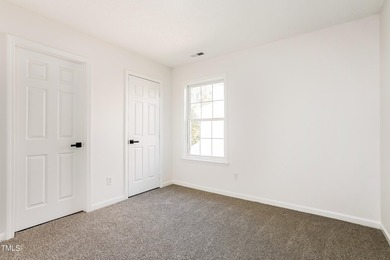 This fully refreshed 4-bedroom, 2.5-bath home with a 2-car - photo 8
