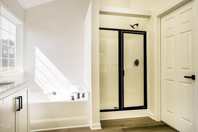 This fully refreshed 4-bedroom, 2.5-bath home with a 2-car - photo 9