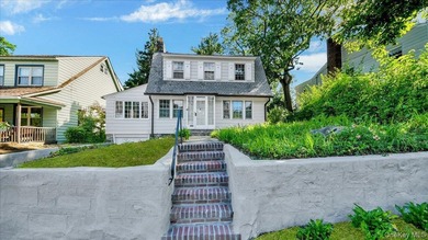 This classic Dutch Colonial house is set on an extra-large lot - photo 1
