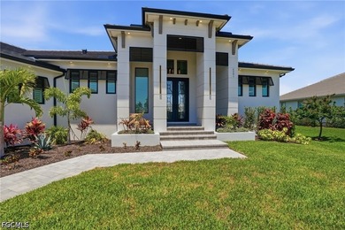 ULTIMATE GULF ACCESS MASTERPIECE WITH INTERSECTING CANAL VIEWS - photo 4