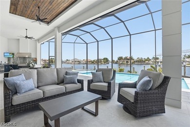 ULTIMATE GULF ACCESS MASTERPIECE WITH INTERSECTING CANAL VIEWS - photo 5