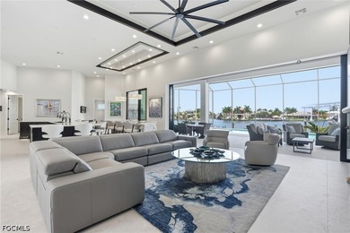 ULTIMATE GULF ACCESS MASTERPIECE WITH INTERSECTING CANAL VIEWS - photo 6