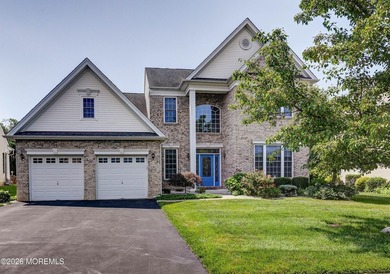Upscale 3,250 SF brick-front Colonial offers a sophisticated - photo 1