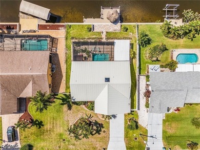 If you've been searching for a Gulf access pool home with the - photo 6
