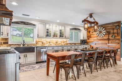Rustic paradise on the water! This incredible home is in - photo 13