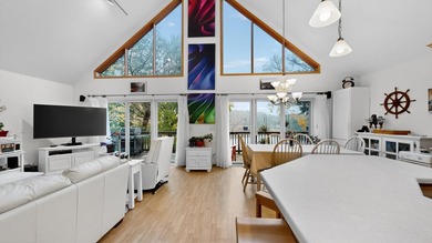 Enjoy stunning water views from this beautiful A-frame home - photo 6