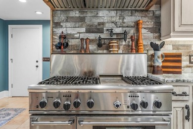 Rustic paradise on the water! This incredible home is in - photo 17