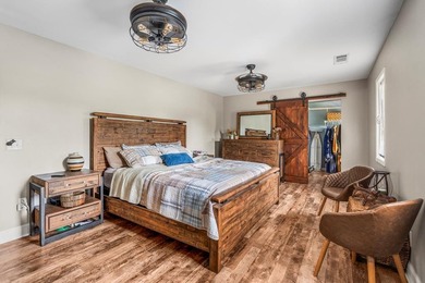 Rustic paradise on the water! This incredible home is in - photo 22