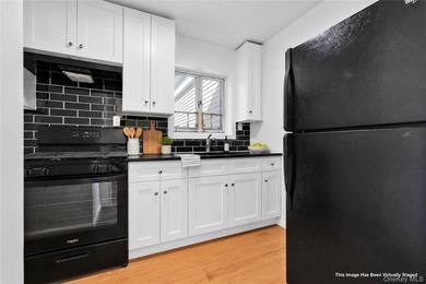 Welcome to 224-01 Hillside Avenue, Upper Level, a bright and - photo 9
