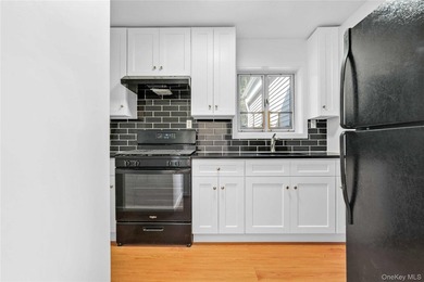 Welcome to 224-01 Hillside Avenue, Upper Level, a bright and - photo 10