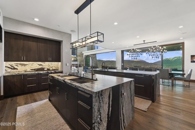 Elevated above the rest, this striking mountain estate claims - photo 12