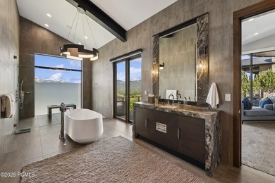 Elevated above the rest, this striking mountain estate claims - photo 31