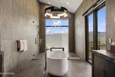 Elevated above the rest, this striking mountain estate claims - photo 32