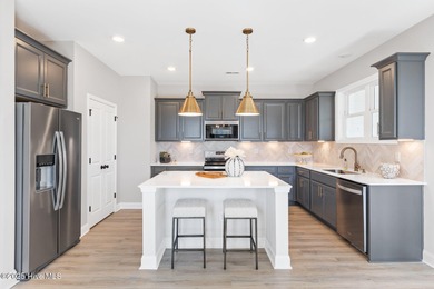 Brand new and move-in ready in Anchors Bend Townes. This