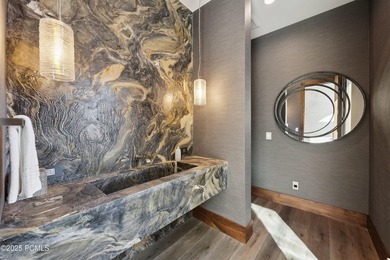 Elevated above the rest, this striking mountain estate claims - photo 34