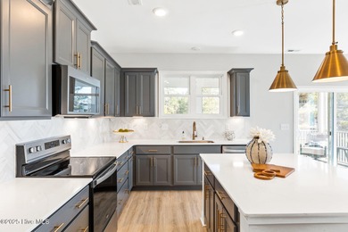 Brand new and move-in ready in Anchors Bend Townes. This