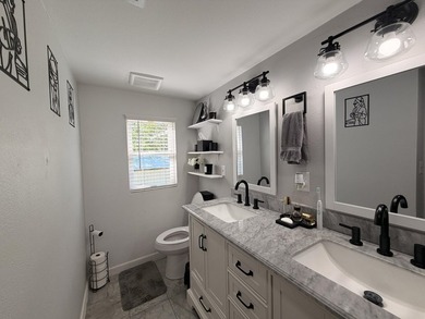 Completely remodeled and move-in ready, this quaint home blends - photo 8