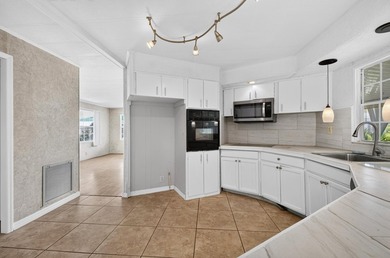 Active 55+ community with 3 pools and clubhouses, Tennis - photo 21