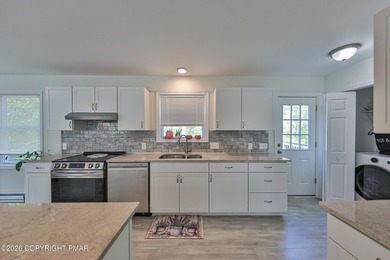Beautiful 2-year-young bi-level home situated on a spacious - photo 12