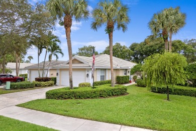 Lake Home For Sale in Palm Beach Gardens, Florida