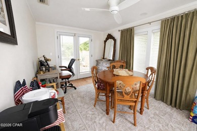 Welcome to this charming 3-bedroom, 2-bathroom home on one of - photo 12