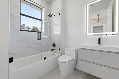 A refined new construction residence in historic Sailboat Bend - photo 28