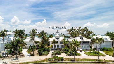 #128 *Twin Shores Cottage* is ideally positioned on the coveted - photo 6
